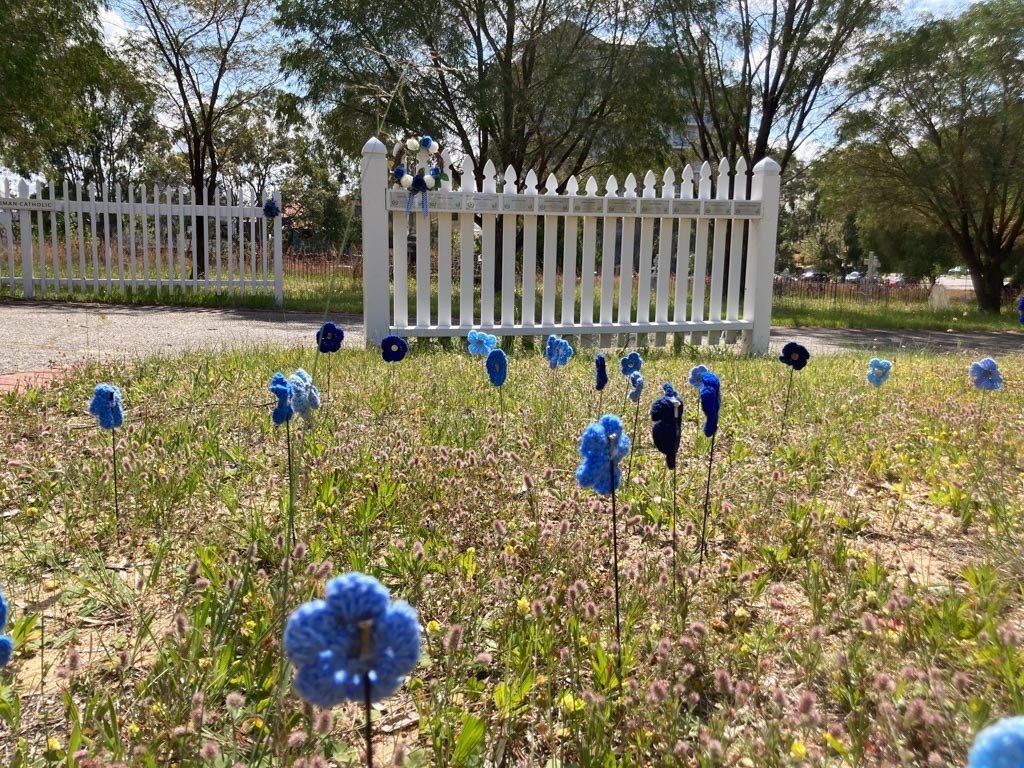 Largest ceremony for unmarked police graves held at East Perth Cemeteries